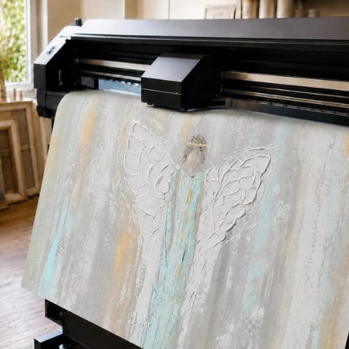 A large-format printer printing an angel painting onto canvas