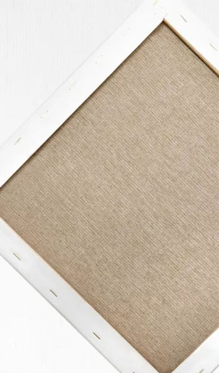 The back of an ARTMiE canvas, stretched on its wooden frame